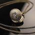 Mini montre clapet bronze couronne